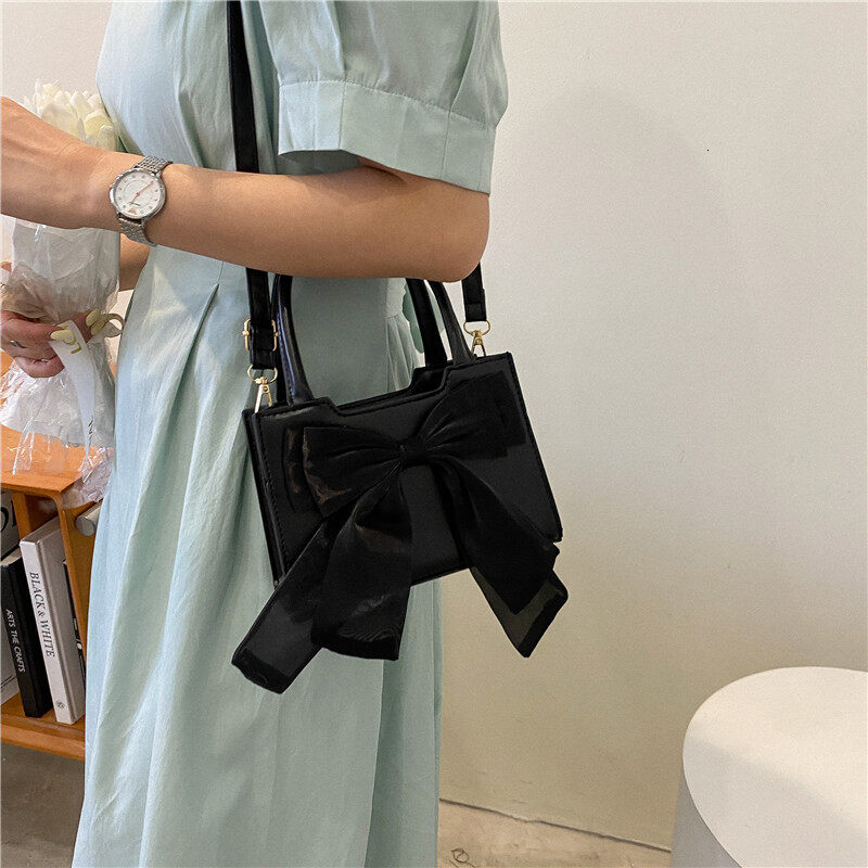Cute Fairy Knot Handbag for Women New 2023 Summer Chic Versatile Shoulder Crossbody Bag with Soft Surface Zipper Closure