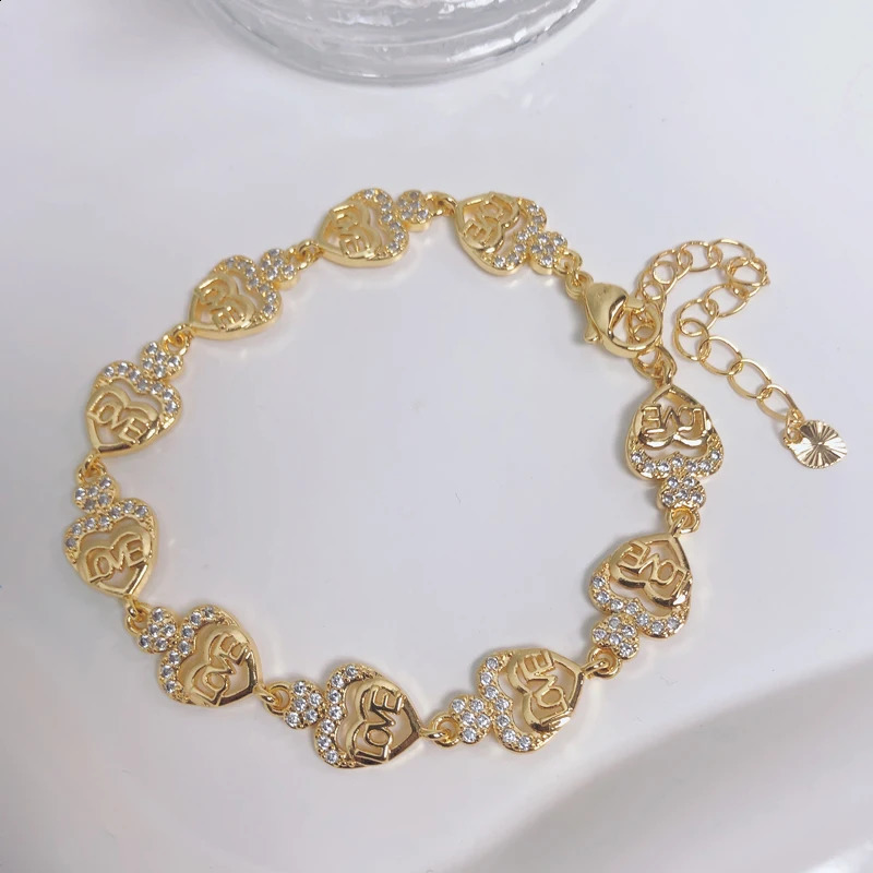 Simple and stylish Korean style gold-plated brass jewelry CZ zircon love letter circular airplane bracelet 240921
