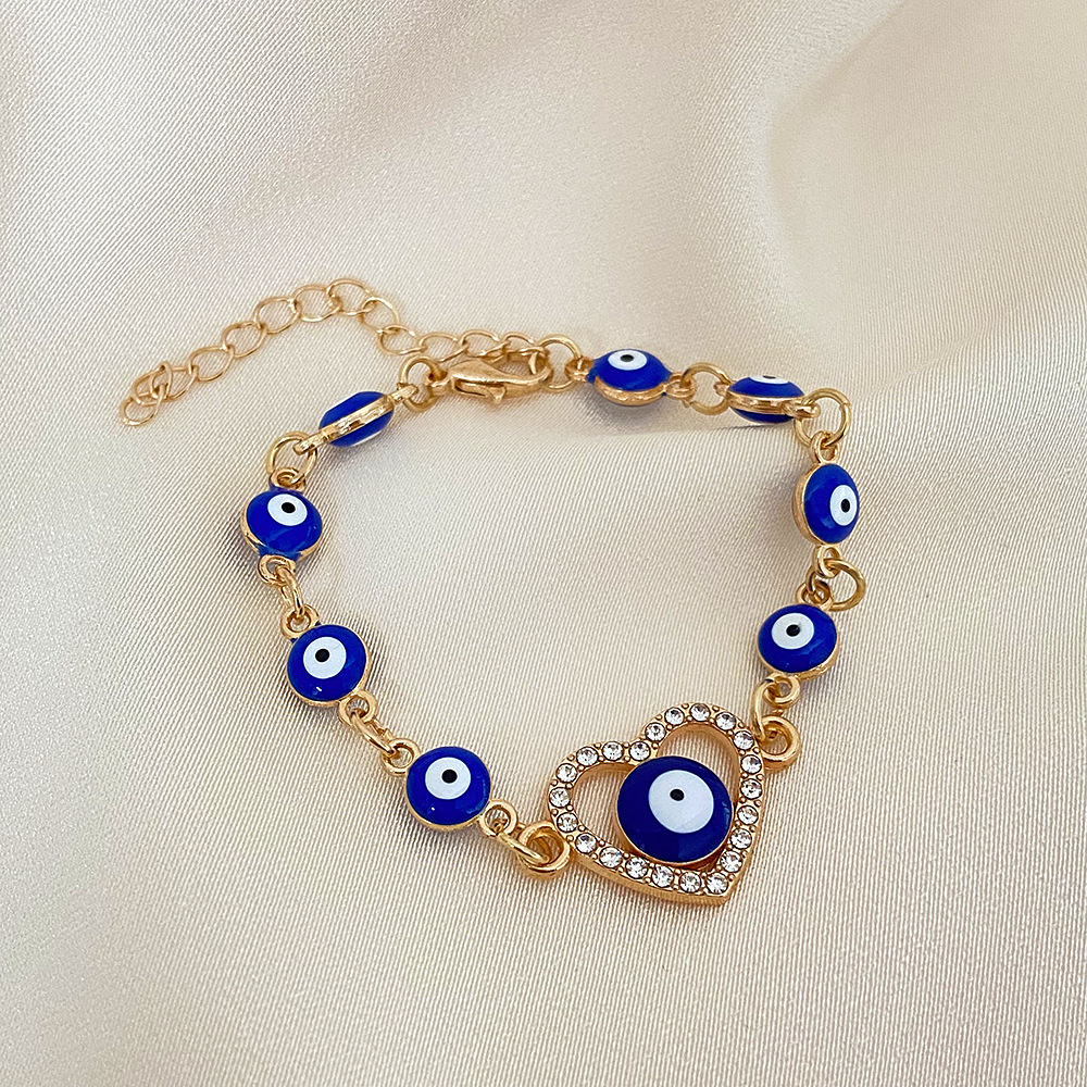 Beaded bracelet European and American Fashion Handpiece Devil's Eye Hollow Diamond Heart Drip Oil Eye Bracelet