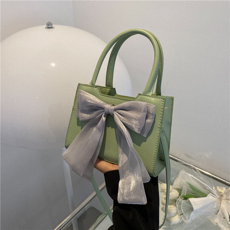 Cute Fairy Knot Handbag for Women New 2023 Summer Chic Versatile Shoulder Crossbody Bag with Soft Surface Zipper Closure