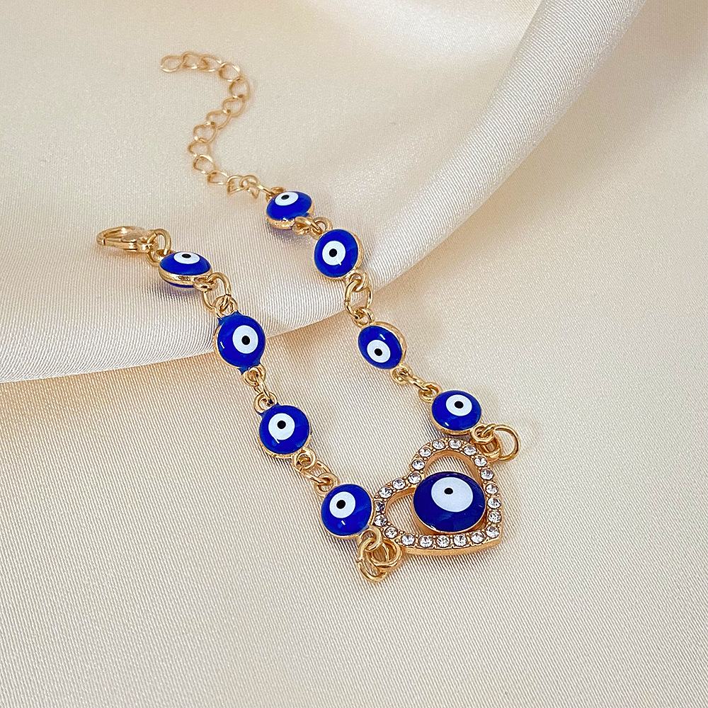 Beaded bracelet European and American Fashion Handpiece Devil's Eye Hollow Diamond Heart Drip Oil Eye Bracelet