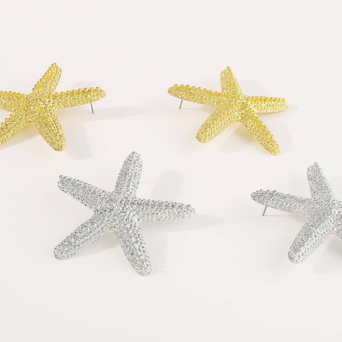 Simple starfish alloy earrings temperament fashion geometric star resort stud earrings Free shipping