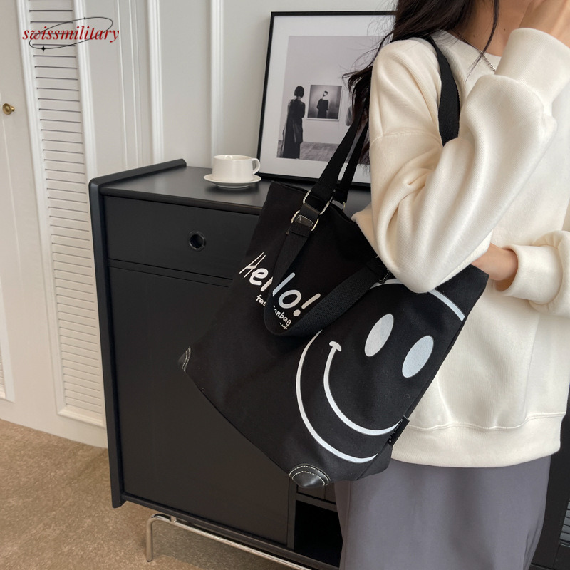 2024 new large capacity fashionable simple shoulder canvas bag Korean version casual student smig face handbag for women #27 Swissmilitary