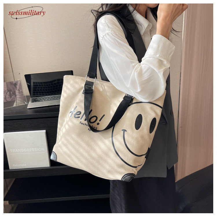 2024 new large capacity fashionable simple shoulder canvas bag Korean version casual student smig face handbag for women #27 Swissmilitary