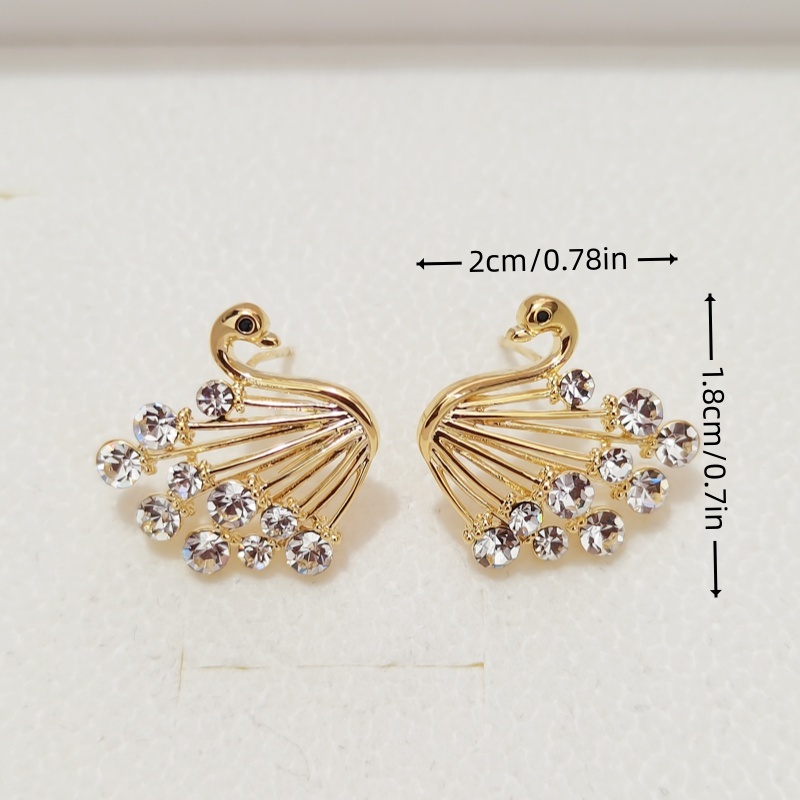 Earring swan shaped zirconium stud earrings with gold-plated copper body and design for high quality and luxury earrings