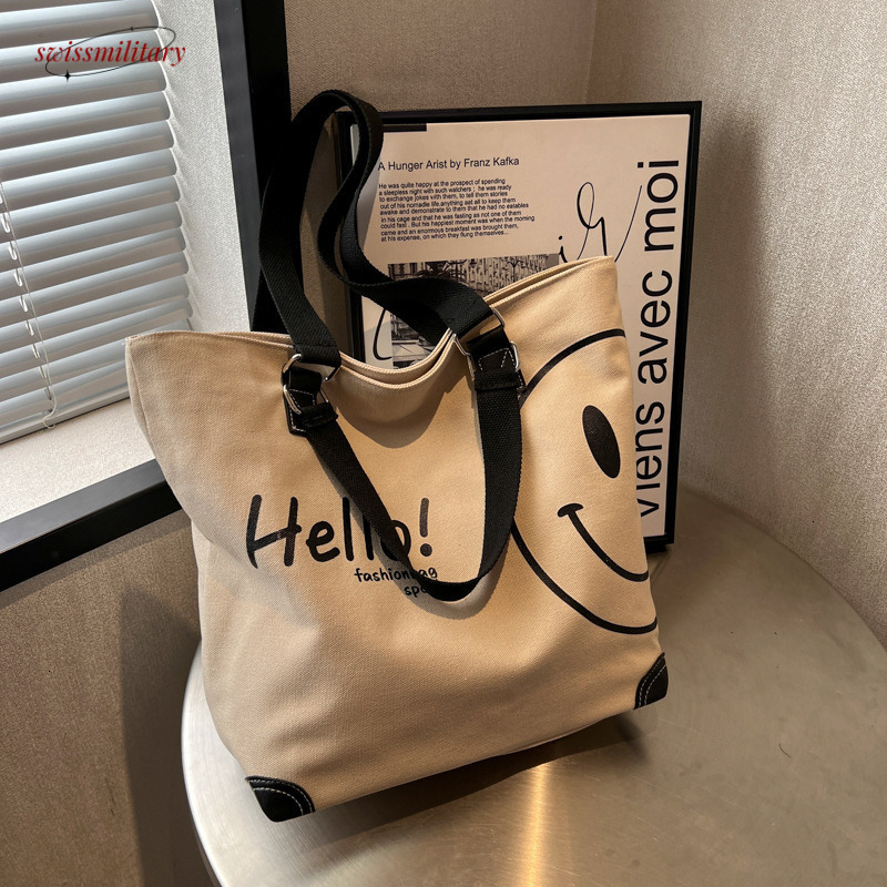 2024 new large capacity fashionable simple shoulder canvas bag Korean version casual student smig face handbag for women #27 Swissmilitary