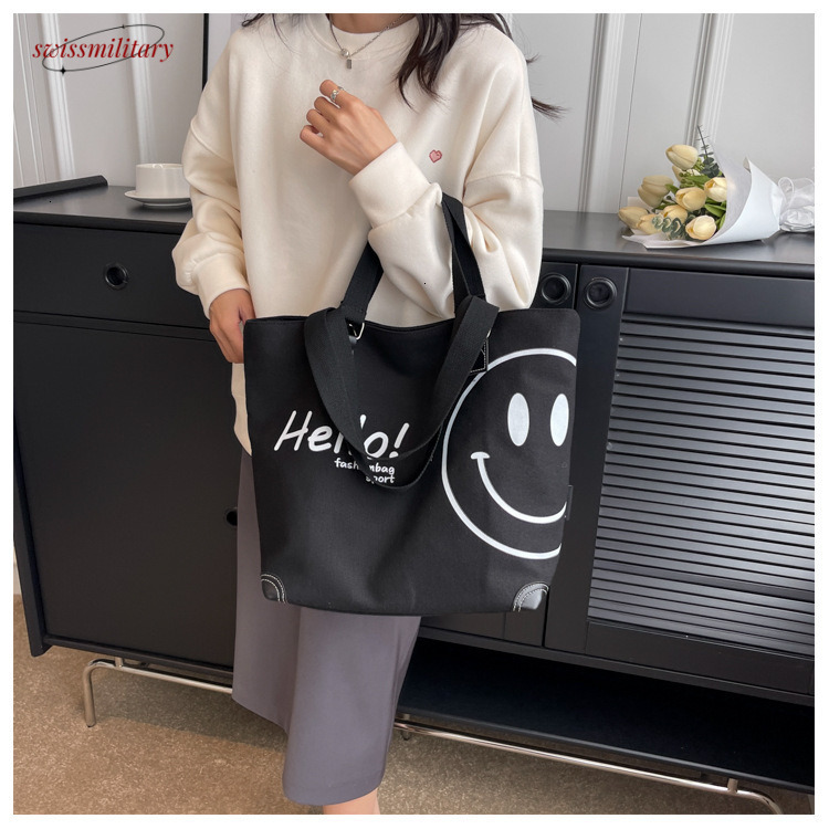 2024 new large capacity fashionable simple shoulder canvas bag Korean version casual student smig face handbag for women #27 Swissmilitary