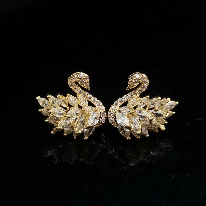 Designer earring swan shaped zirconium stud earrings with gold-plated copper body and design for high quality and luxury earrings