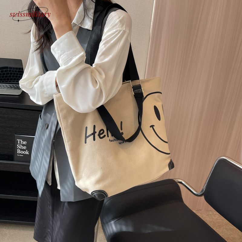 2024 new large capacity fashionable simple shoulder canvas bag Korean version casual student smig face handbag for women #27 Swissmilitary