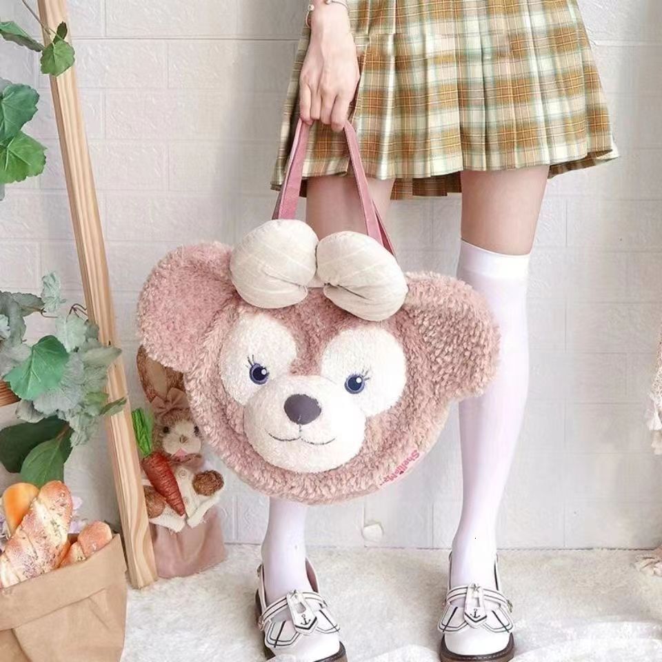 2024 New Designer Backpack Same Plush Cute Butterfly Head Slanted Women's Bag Versatile Big Face Backpack