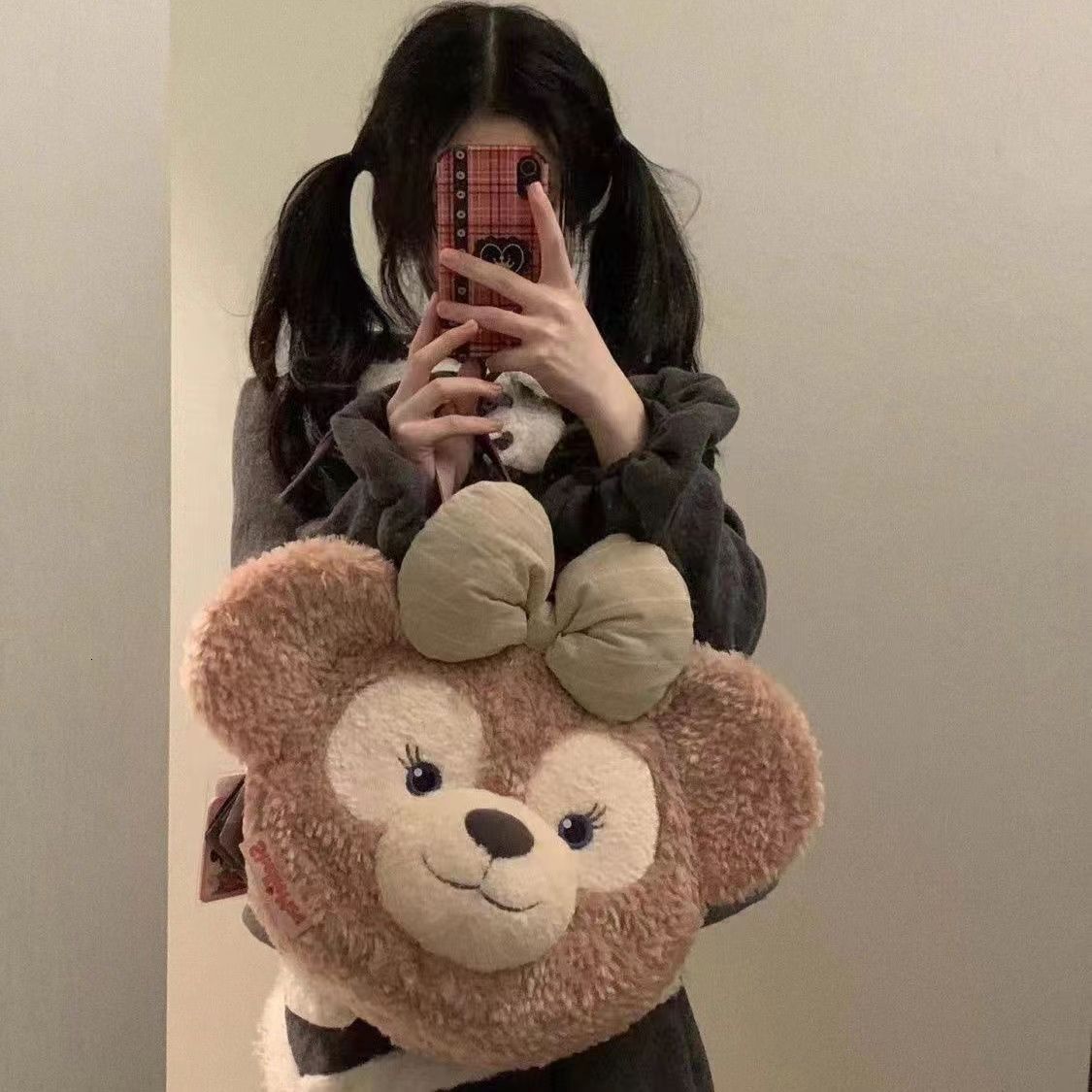 2024 New Designer Backpack Same Plush Cute Butterfly Head Slanted Women's Bag Versatile Big Face Backpack