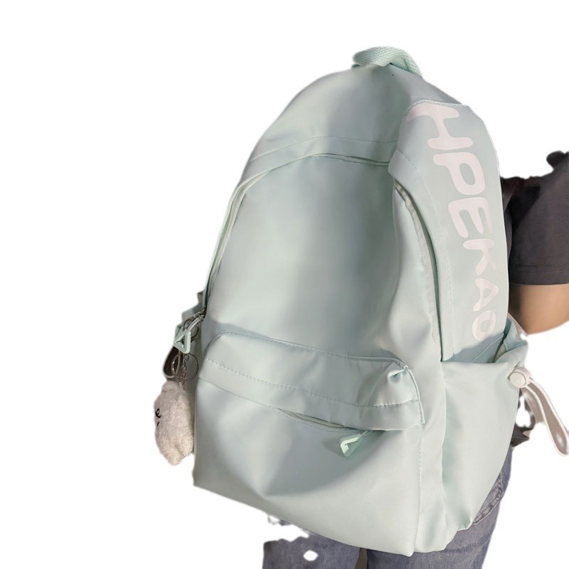 2024 New Designer Backpack Golden Feather Bird Simple Forest Series Multi functional Comparison Letter Large Capacity Solid Color Women's Commuti