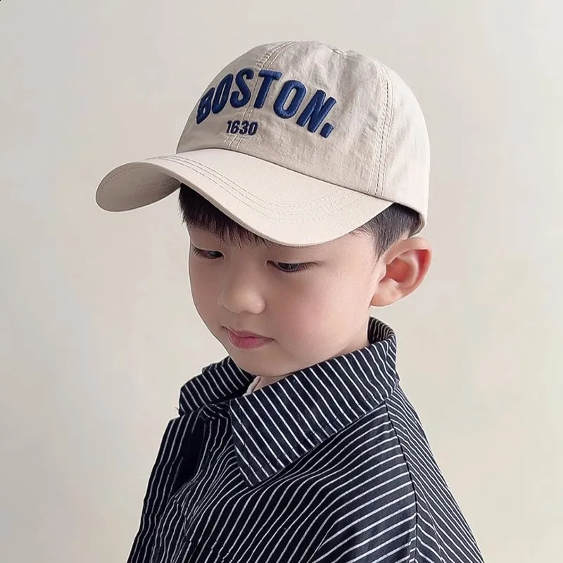 Spring and autumn childrens hats with embroidered letters solid color adjustable sun protection baseball caps Korean boys girls foot 240925
