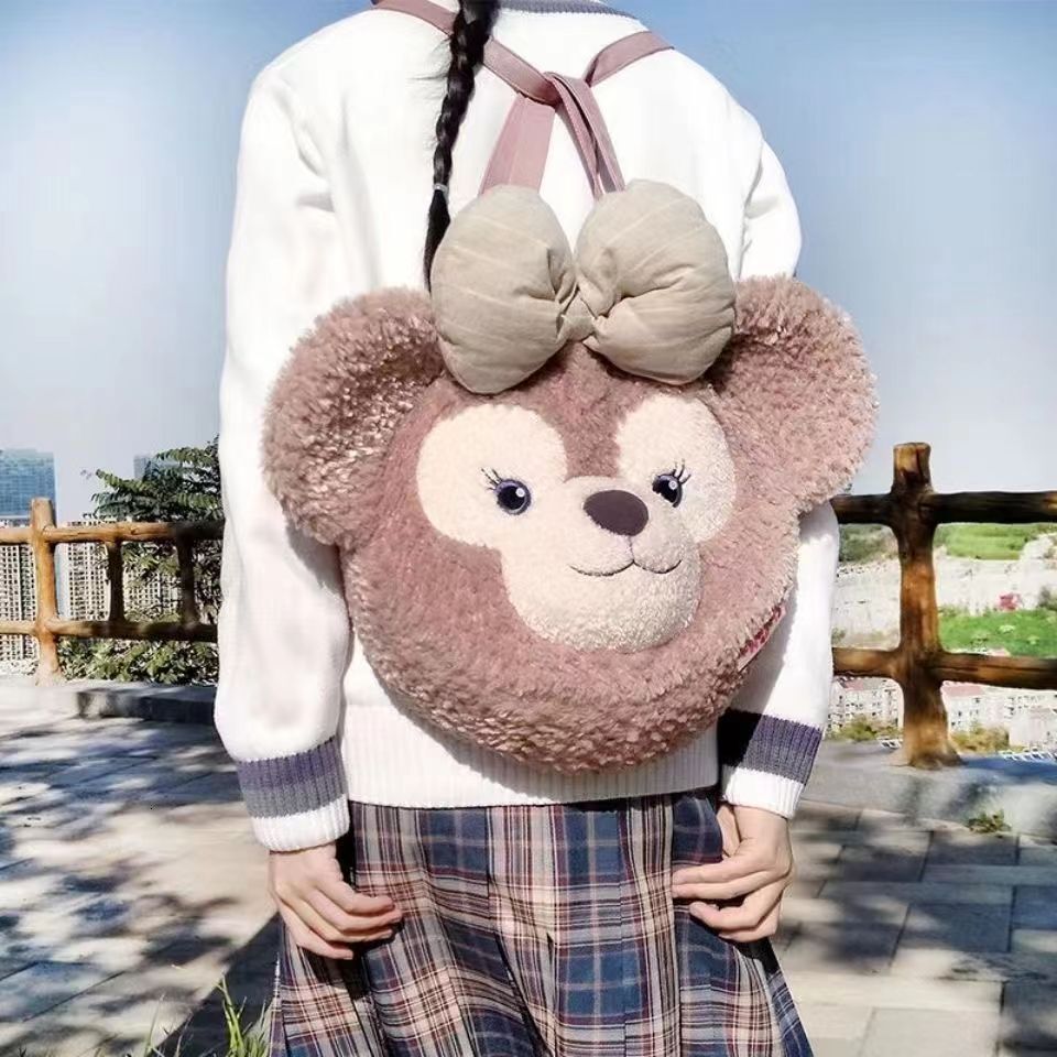 2024 New Designer Backpack Same Plush Cute Butterfly Head Slanted Women's Bag Versatile Big Face Backpack