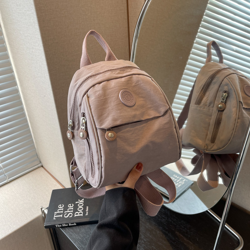 New Designer Backpack leisure for Girls Commuting Shopping traveling bag Small Backpack Backpack Leisure Multi functional Lightweight Backpack Ins Min