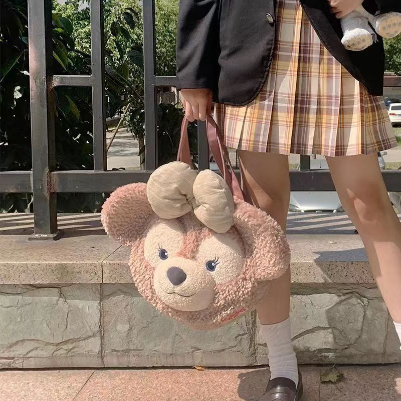 2024 New Designer Backpack Same Plush Cute Butterfly Head Slanted Women's Bag Versatile Big Face Backpack