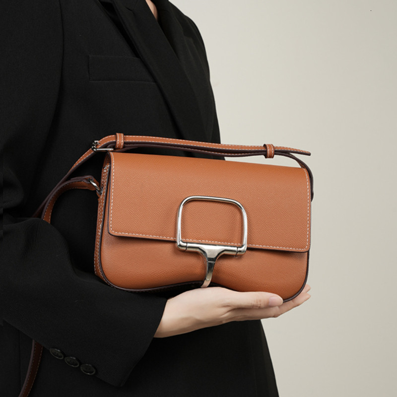 Women's Cowhide Handbags: Palm Print Hot Leather Saddle Crossbody Bag