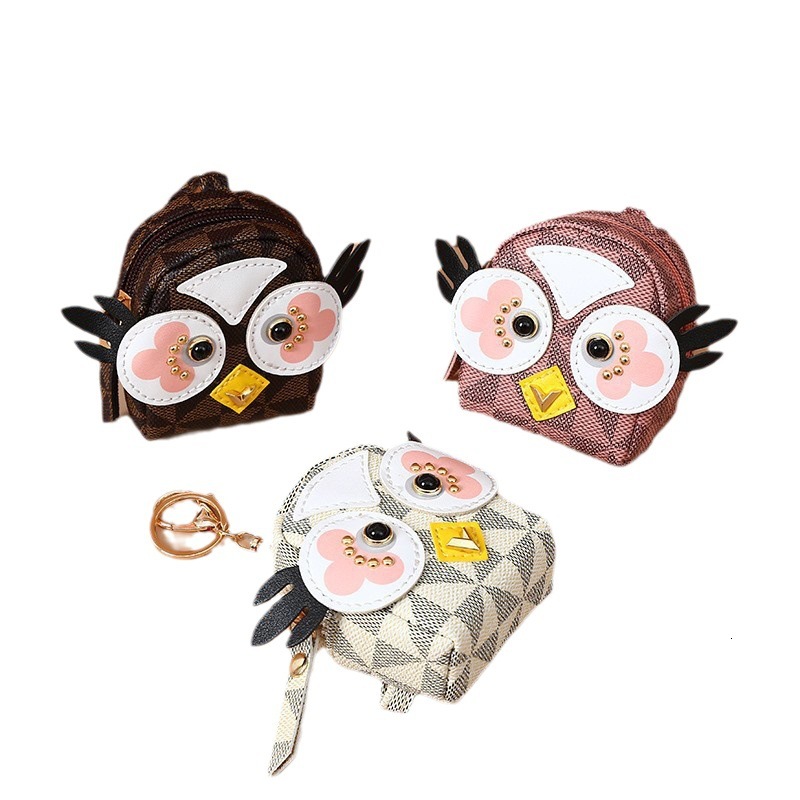 2025 New Designer Wallet Big Eyes Owl Creative Zero Wallet Korean Version Girl Heart shaped Coin Cartoon Mini Primary wallet School Key Bag