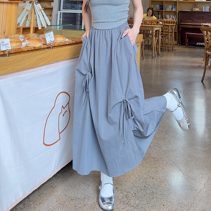 Radish Uncle Butterfly workwear for women 2024 new high waist slimming effect, large swing umbrella skirt, mid length skirt