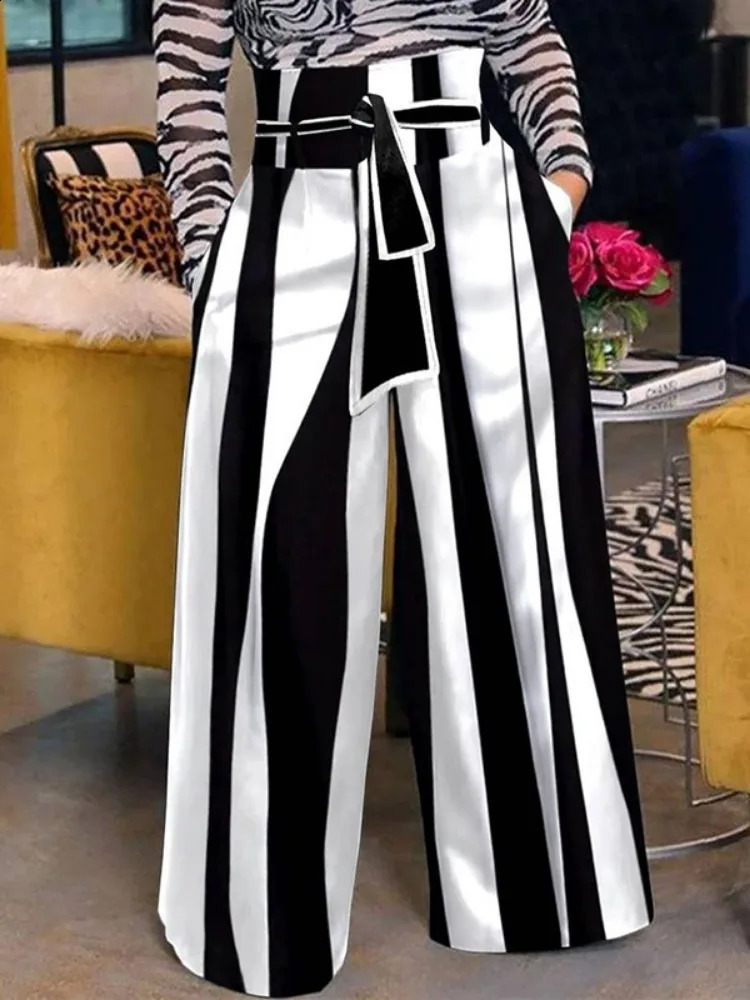 Free black and white striped womens pants high waisted straps wide legs at the waist bottom of urban womens streetwear 240923