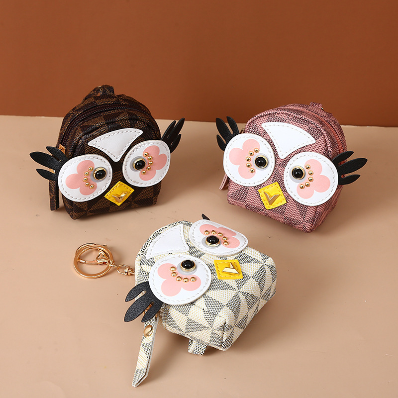 2025 New Designer Wallet Big Eyes Owl Creative Zero Wallet Korean Version Girl Heart shaped Coin Cartoon Mini Primary wallet School Key Bag