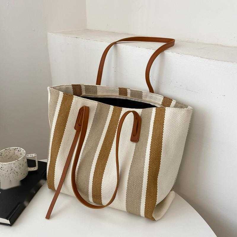 CMM Korean Large Capacity Womens Shoulder Bag Womens New Simple Vertical Stripe Leisure Tote Bag Fashion Handbag
