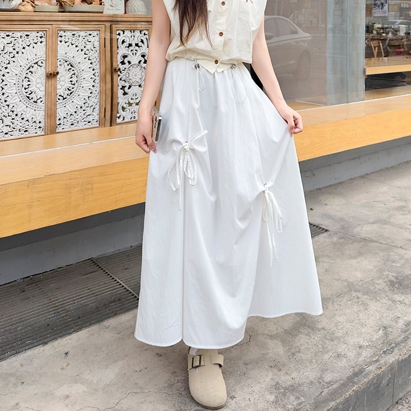 Radish Uncle Butterfly workwear for women 2024 new high waist slimming effect, large swing umbrella skirt, mid length skirt