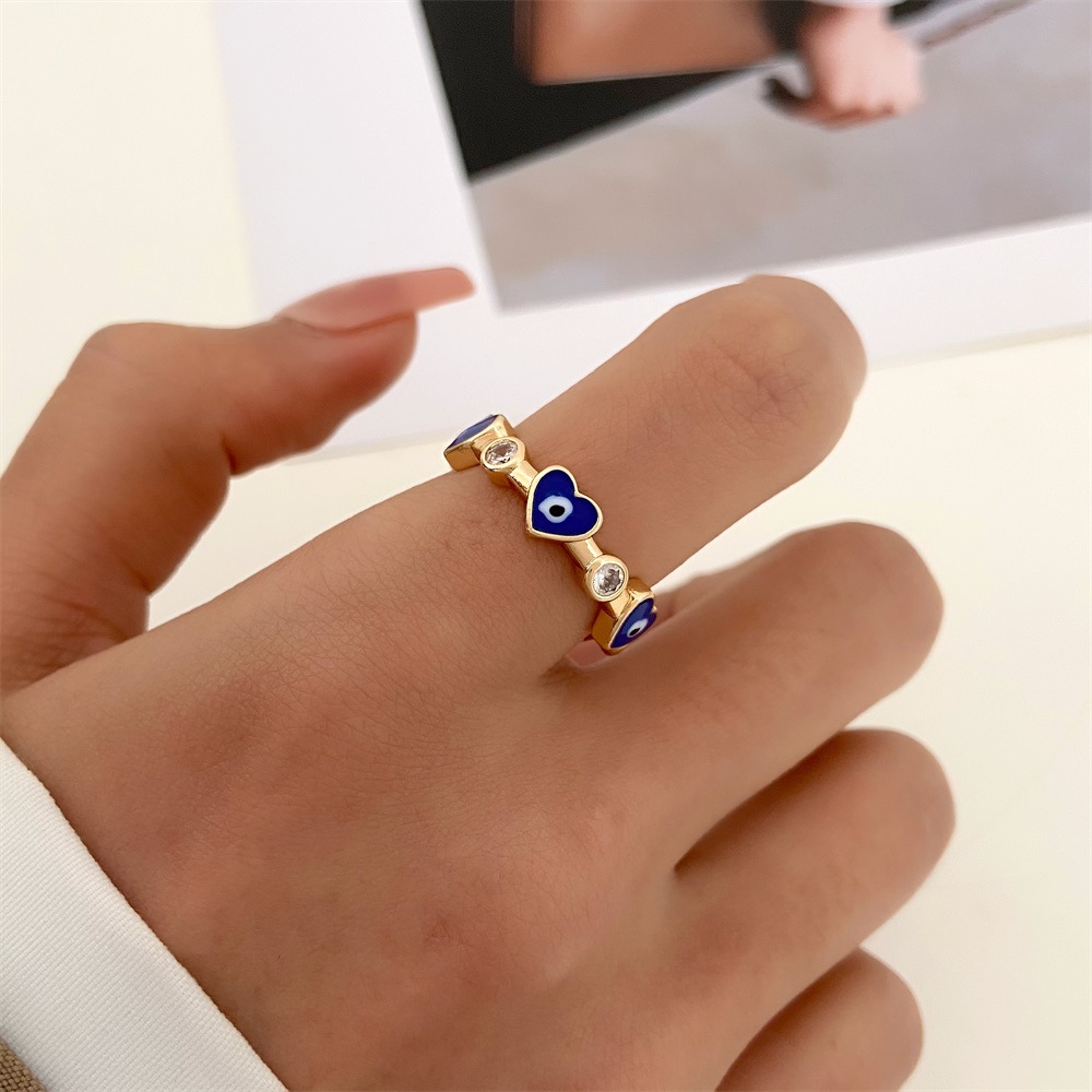 Elegant 1 4 K Gold Evil Eye Ring for Women - Intricate Love Heart Shape & Sparkling Details