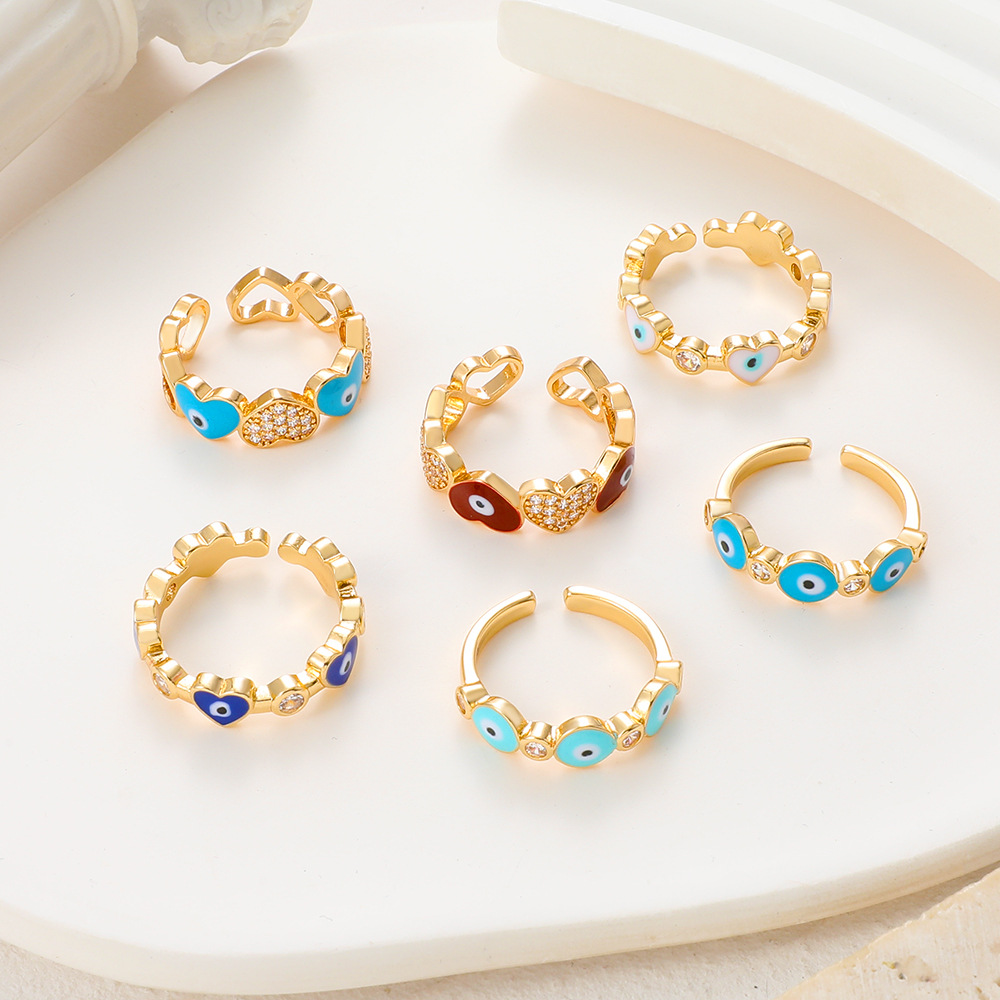 Elegant 1 4 K Gold Evil Eye Ring for Women - Intricate Love Heart Shape & Sparkling Details