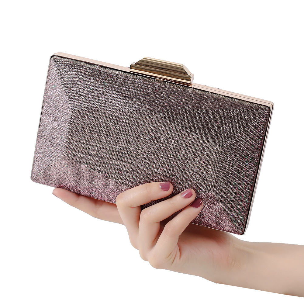 The new three-dimensional geometry dinner bag all match gradual change satin dress banquet bag European and American style simple hand bag