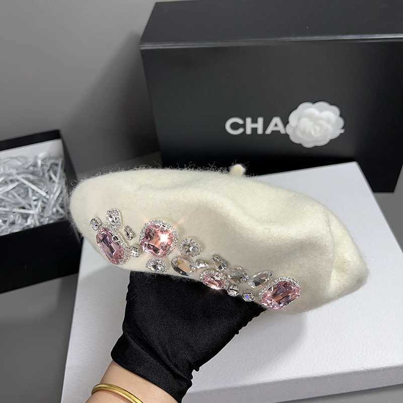 Womens winter beret made of soft wool and decorated with luxurious rhinestones fashionable and reserved as a warm hat for Chapeau women W240928