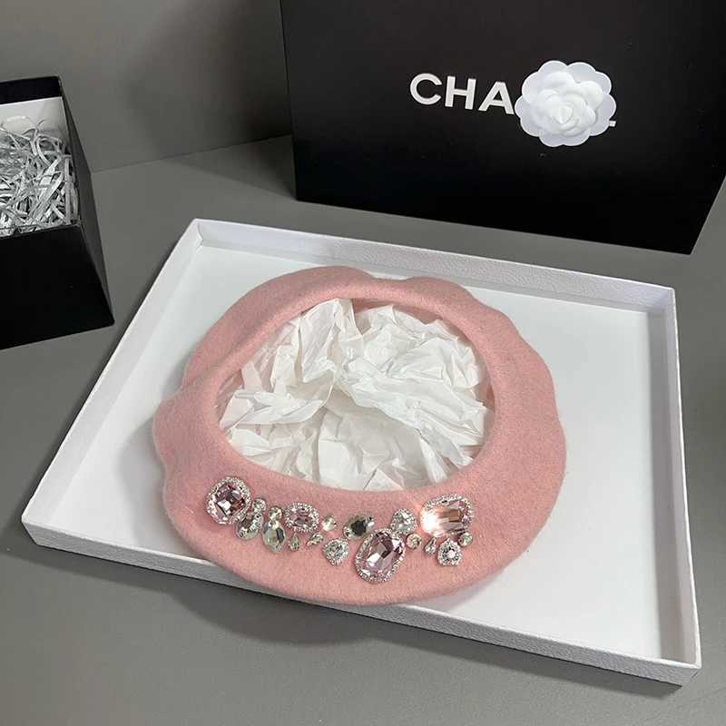 Womens winter beret made of soft wool and decorated with luxurious rhinestones fashionable and reserved as a warm hat for Chapeau women W240928