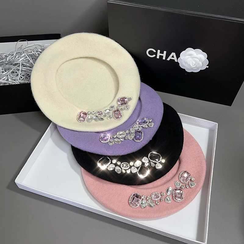 Womens winter beret made of soft wool and decorated with luxurious rhinestones fashionable and reserved as a warm hat for Chapeau women W240928
