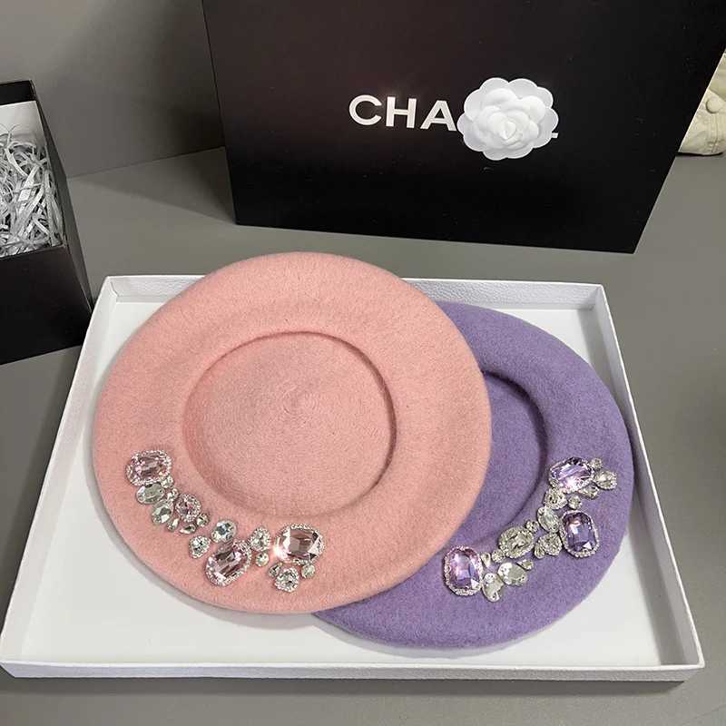Womens winter beret made of soft wool and decorated with luxurious rhinestones fashionable and reserved as a warm hat for Chapeau women W240928