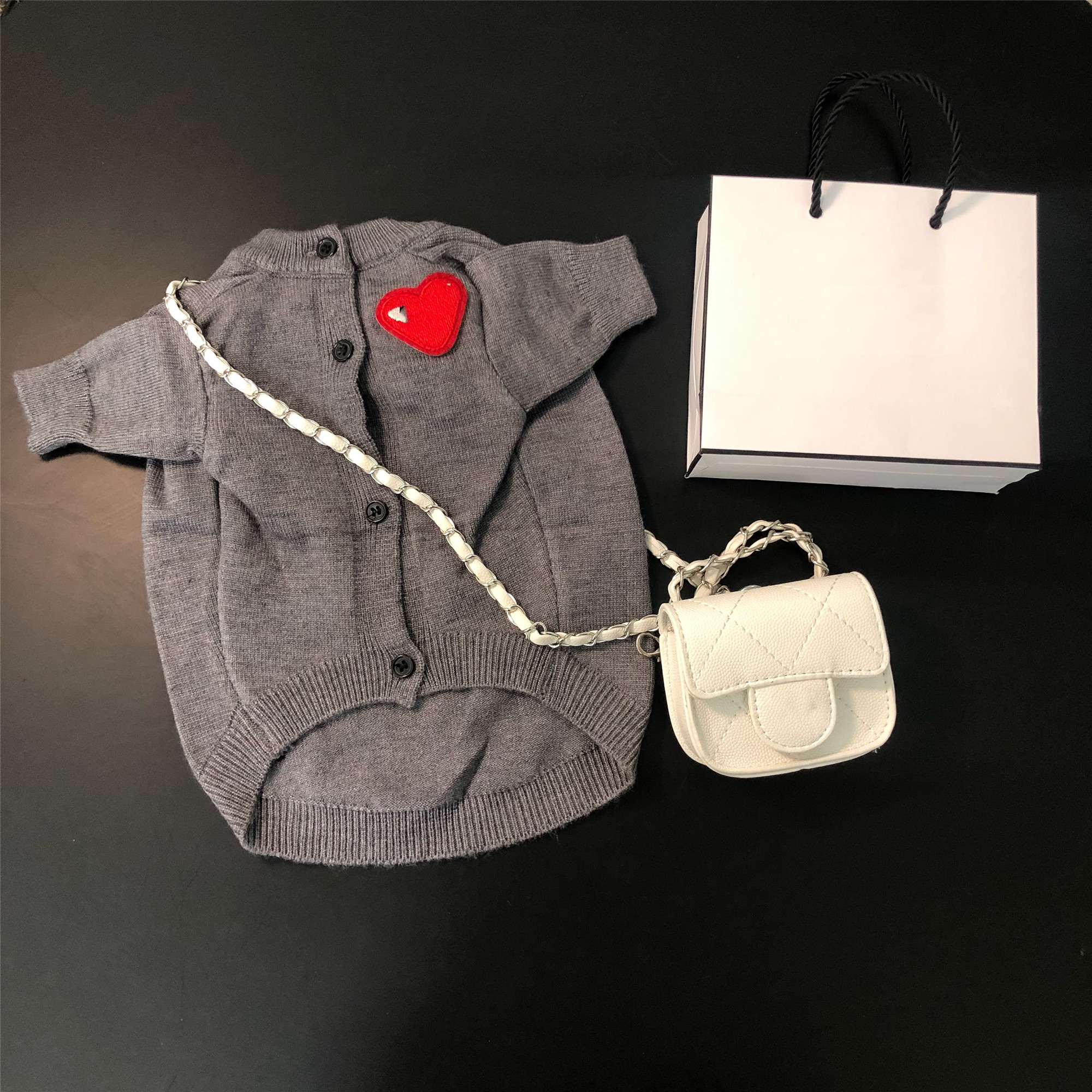 Chic Animal Fashions Collection: Stylish Coat Designs with Love Labels Available for Canine Companions