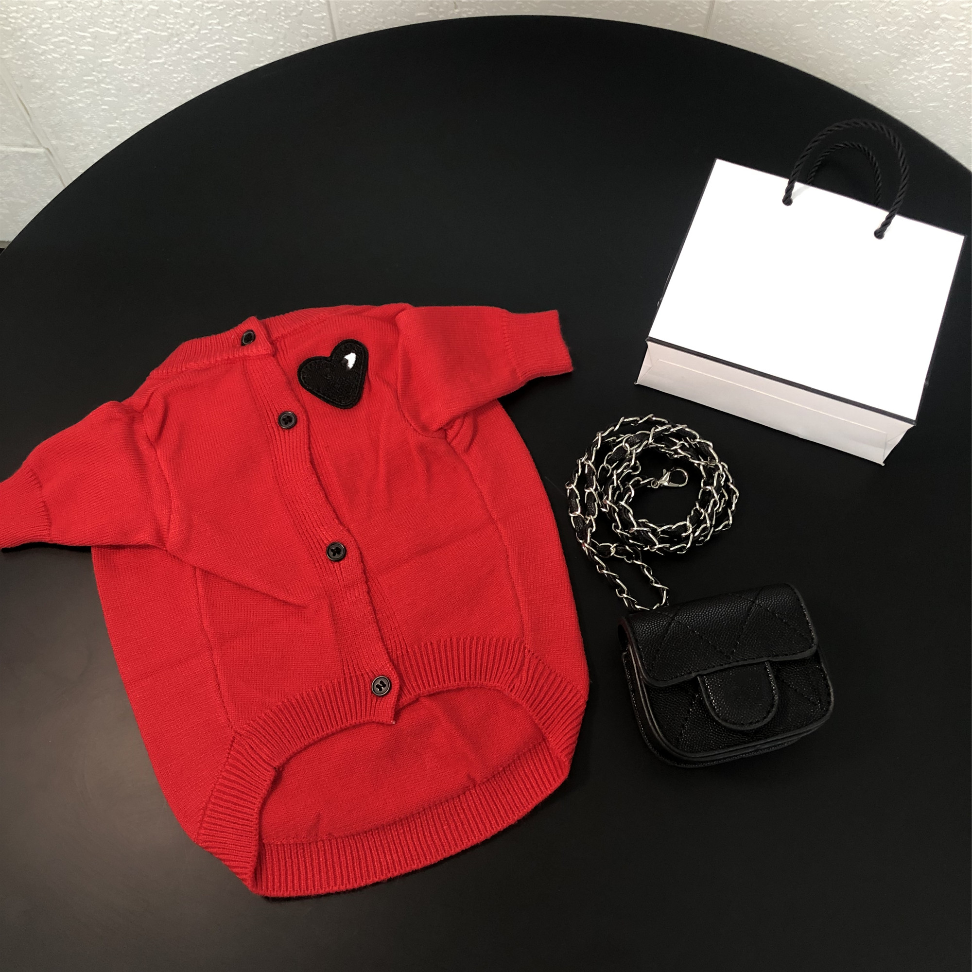 Chic Animal Fashions Collection: Stylish Coat Designs with Love Labels Available for Canine Companions