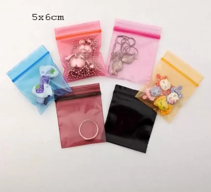 wholesale small ziplock bags ziplock storage bag plastic zip 100pcs lot Gift Bag Plastic Packaging Storage Bags for Herb Tobacoo ZZ