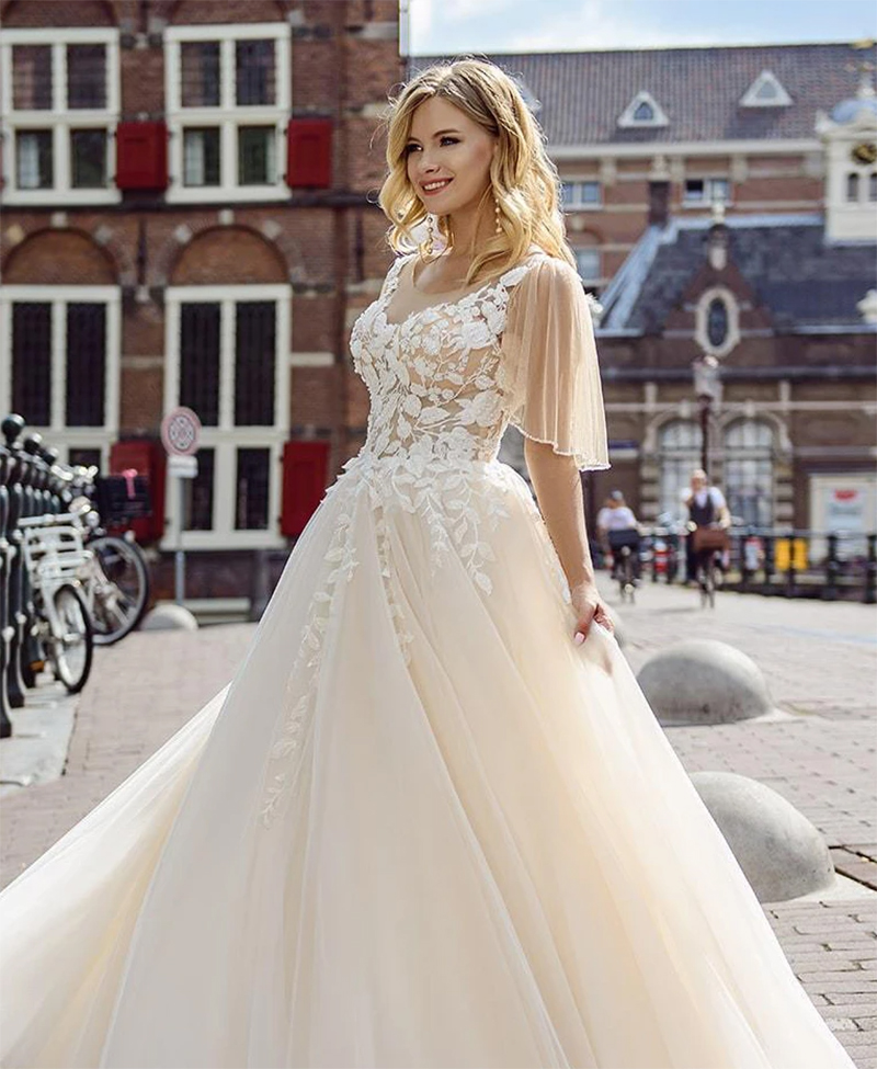 Beach Wedding Dresses Sheer Jewel Neck Short Sleeve A Line Bridal Dresses Boho Lace Appiques Wedding vestido de noiva