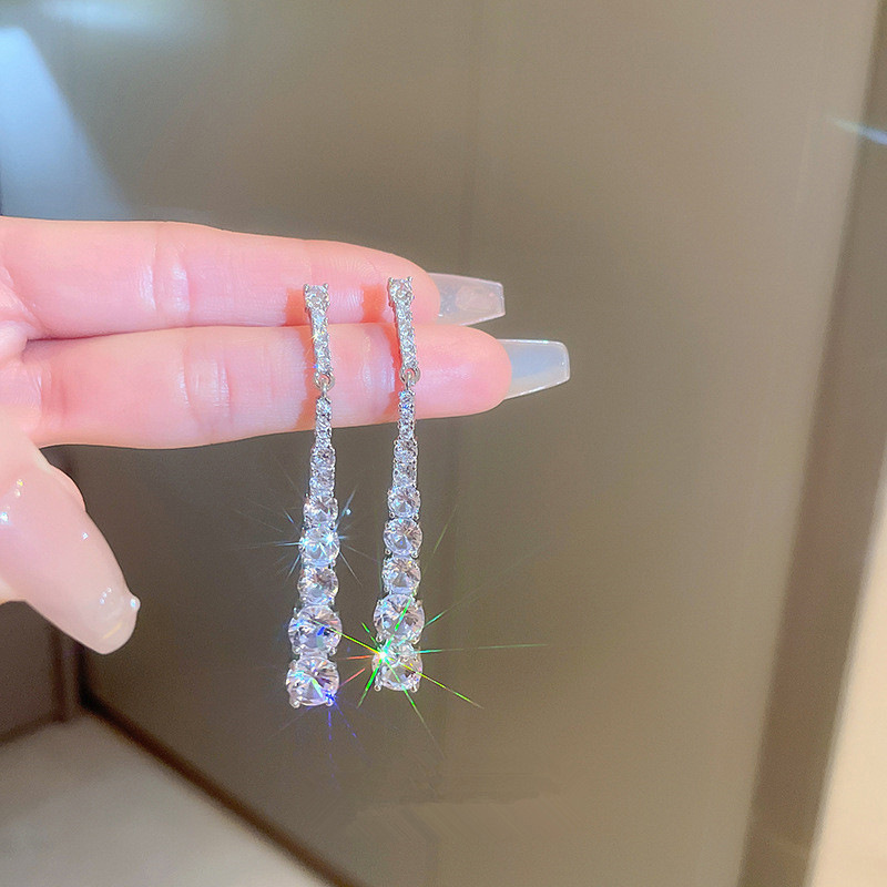 White Cross Dangle Earrings in South American Style and a Sterg Sier