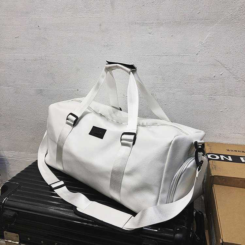 Duffle Bags New Portable Letter Business Travel Bag Pu Men s and Women s Sports Fitness Short Distance Light Storage Luggage 230406