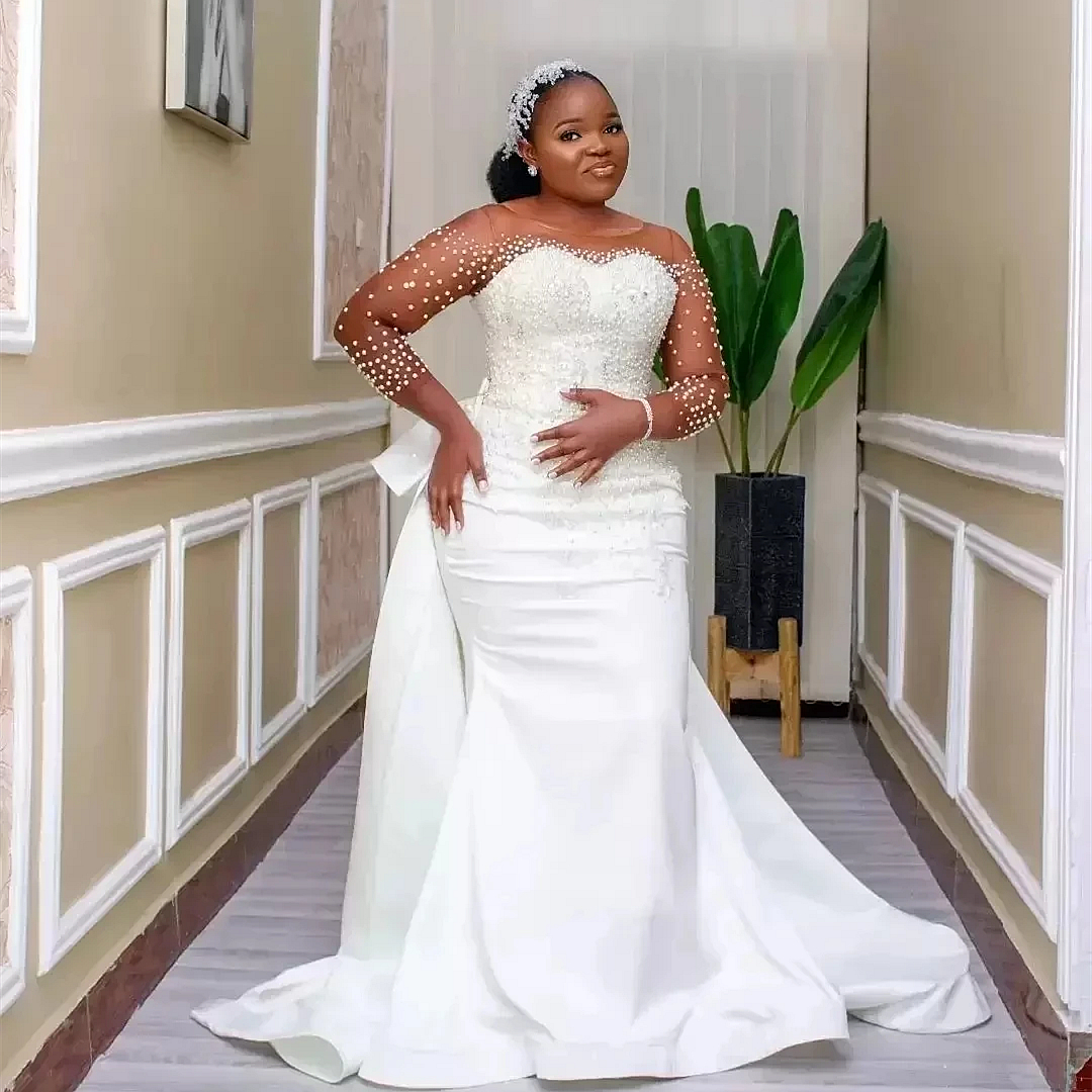 Arabic African Mermaid Wedding Dresses Pearls Beaded Nude Long Sleeves Illusion O-Neck Lace Appliques Elegant White Bridal Gowns With Detachable Bow S