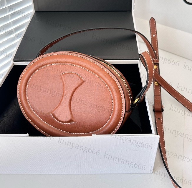 Famous Designer bags quality lady fashion circular Handbag triophe delete cowhide Shoulder Bag high sense Messenger Envelope cross body push hobos package