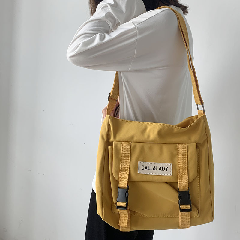 Fashion Simple Messenger Bag Women's South Korea Chic Postman Bag Lady Student Nylon Waterproof Canvas Schoolbag