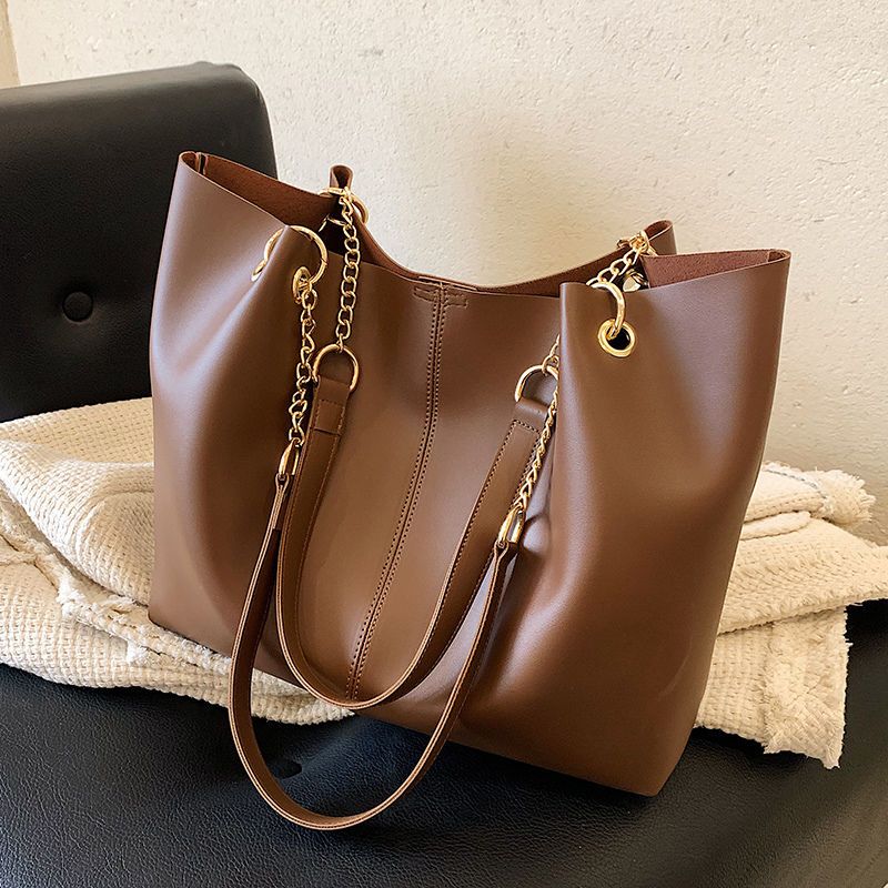 New bag leisure cream bucket bag women's shoulder diagonal tote bag large capacity commuter shoulder bag