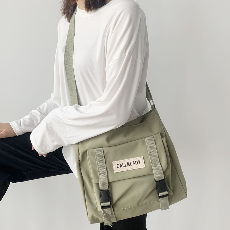 Fashion Simple Messenger Bag Women's South Korea Chic Postman Bag Lady Student Nylon Waterproof Canvas Schoolbag