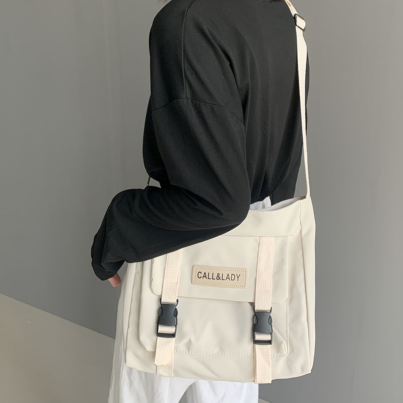 Fashion Simple Messenger Bag Women's South Korea Chic Postman Bag Lady Student Nylon Waterproof Canvas Schoolbag