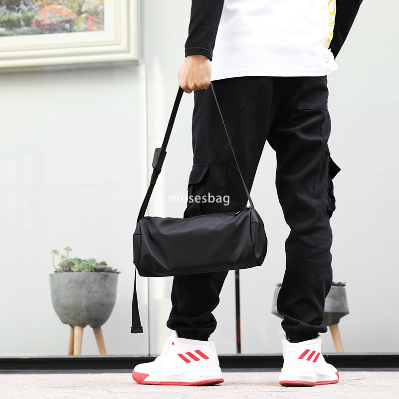 New men's shoulder bag street hip hop style simple sports waterproof crossbody bag fashionable men and women round bucket bag small bag