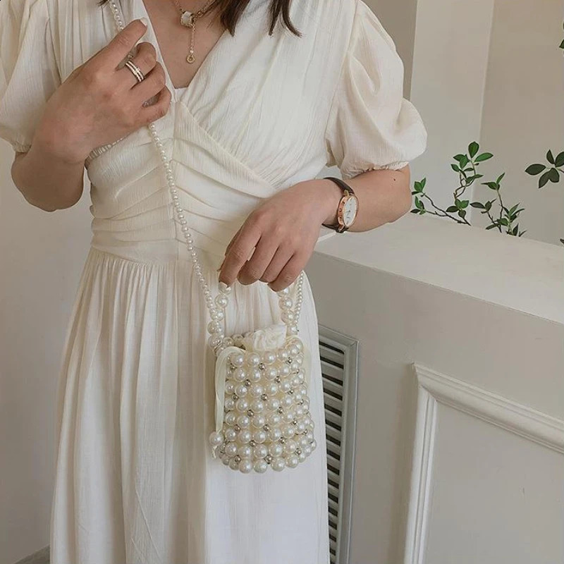 Womens small bucket handbag cross body bag womens pearl handbag womens beach rope shoulder bag 240805