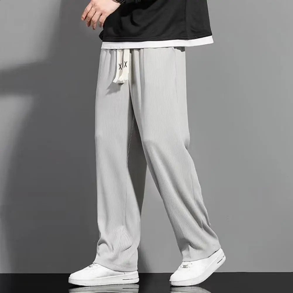 Casual sports pants mens casual pants solid color brushed elastic waist loose fit suitable for pants 240828