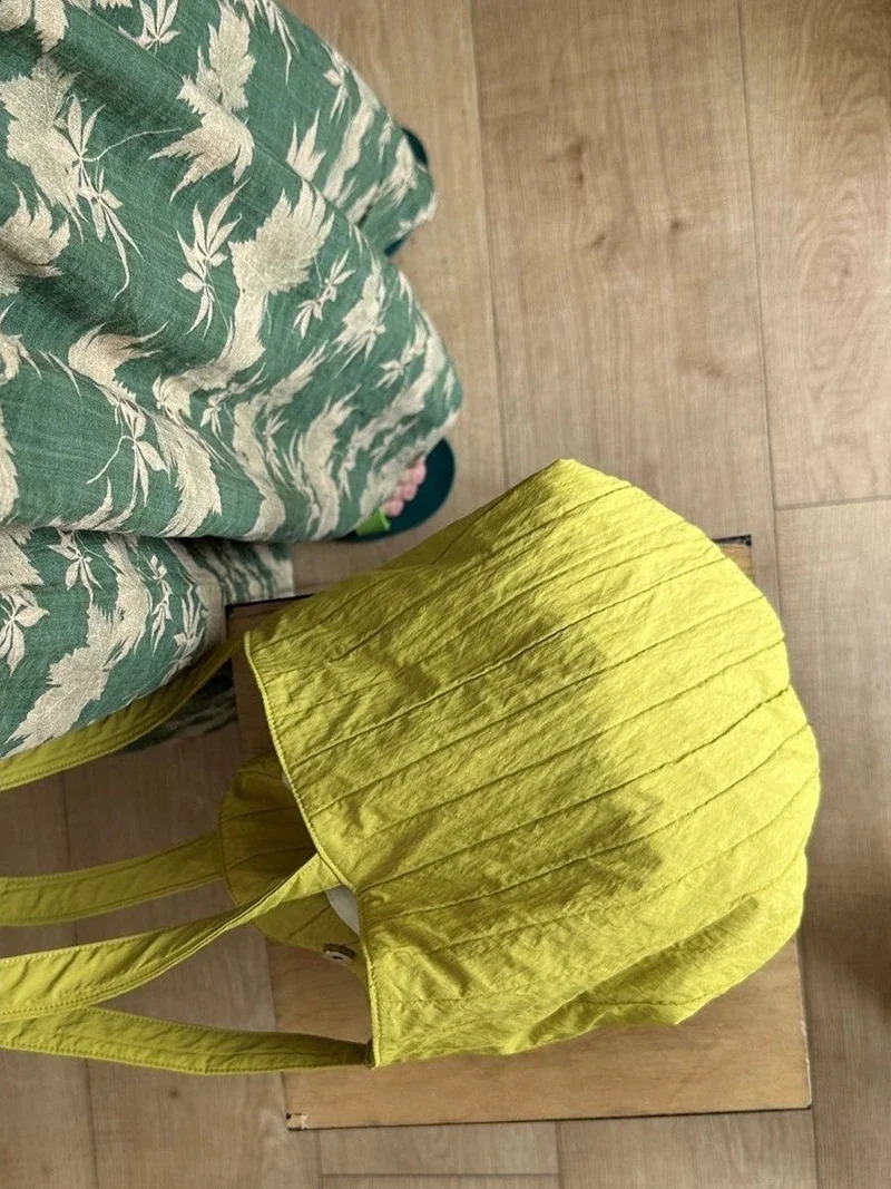 Korean stripe and fold texture bucket bag niche allinone large capacity spring summer commute long thin belt shoulder 240805